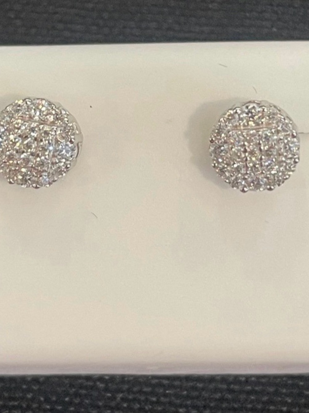 Round 0.50ctw  rhodium plated over 925 sterling Moissanite earrings. Screw backs